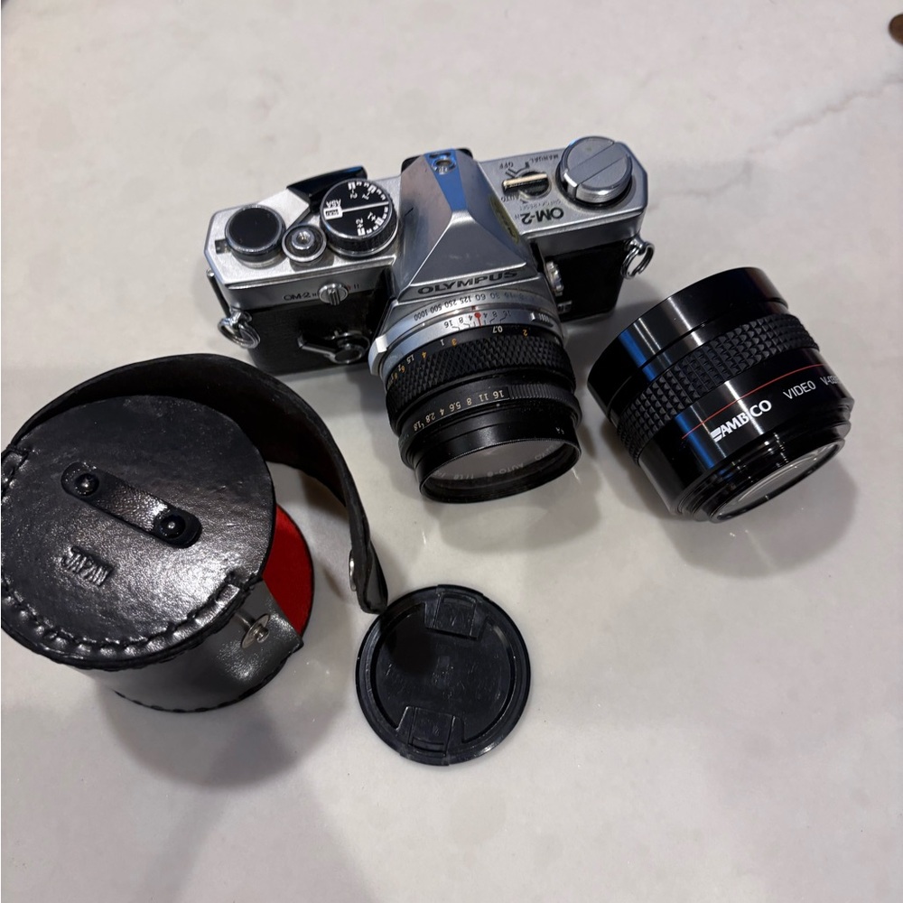 Olympus OM-2 Silver Film Camera with Black Lenses and Case